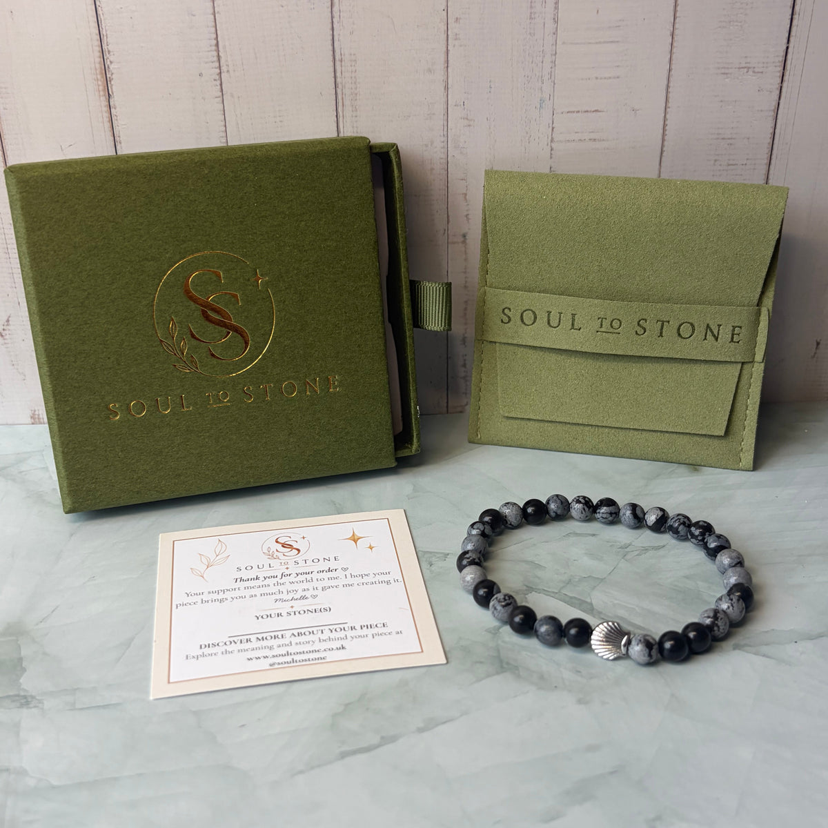 Signature Snowflake Obsidian Bracelet with a Shell Charm