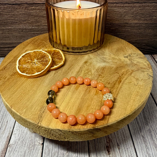 Statement Orange Calcite and Smoky Quartz Bracelet with Lotus Flower Charm